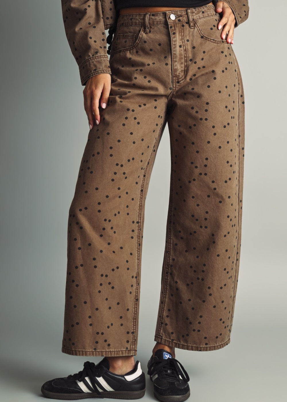 Front view of Miou Muse high-rise barrel jeans in cocoa brown with black polka dots