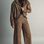 Miou Muse cocoa and black polka dot funnel-neck jacket styled with matching brown polka dot pants