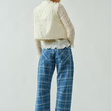 Back view of the Moxie Barrel Eyelet Jeans in blue plaid