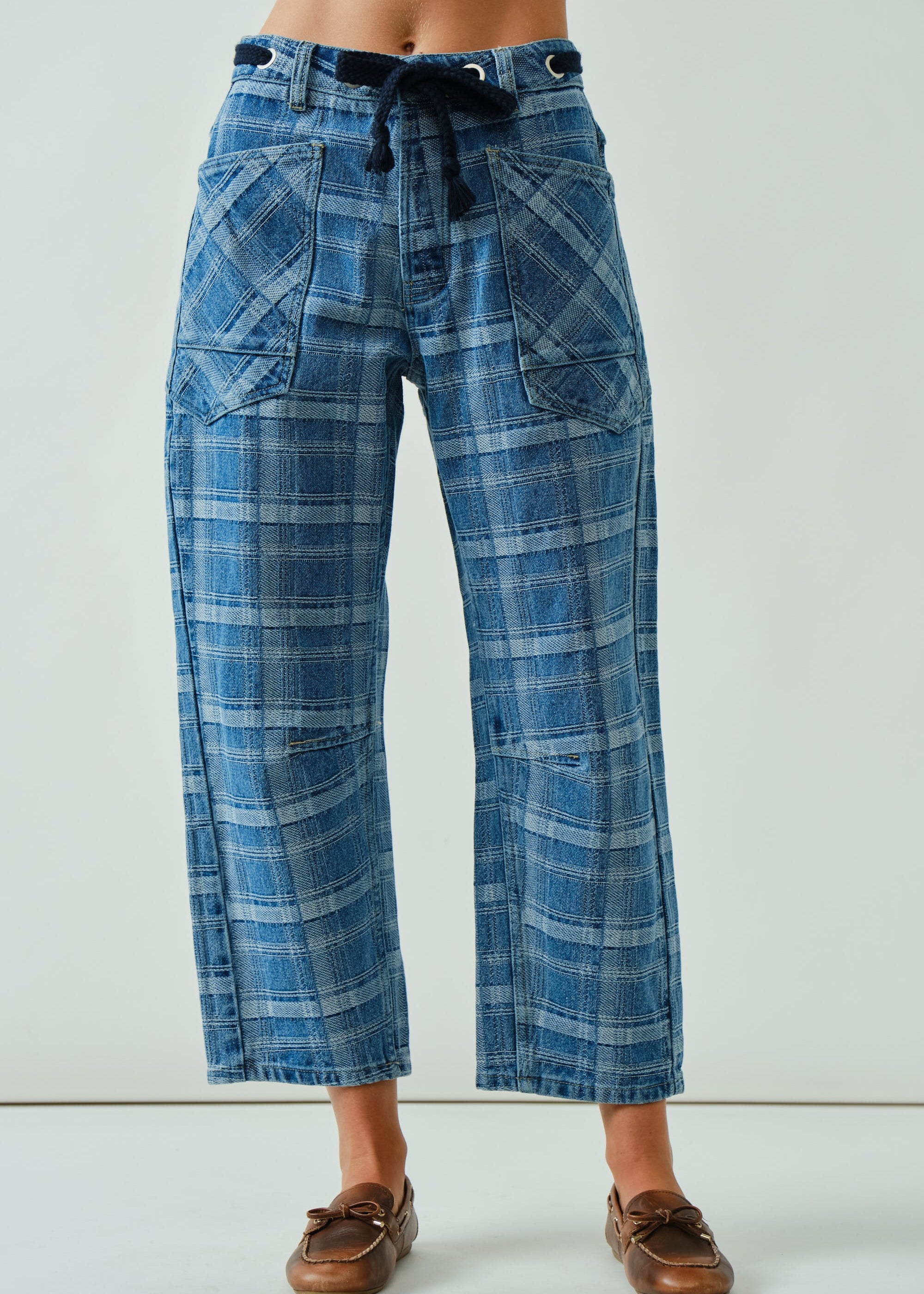 front view of the Moxie Barrel Eyelet Jeans in blue plaid showing barrel-leg fit
