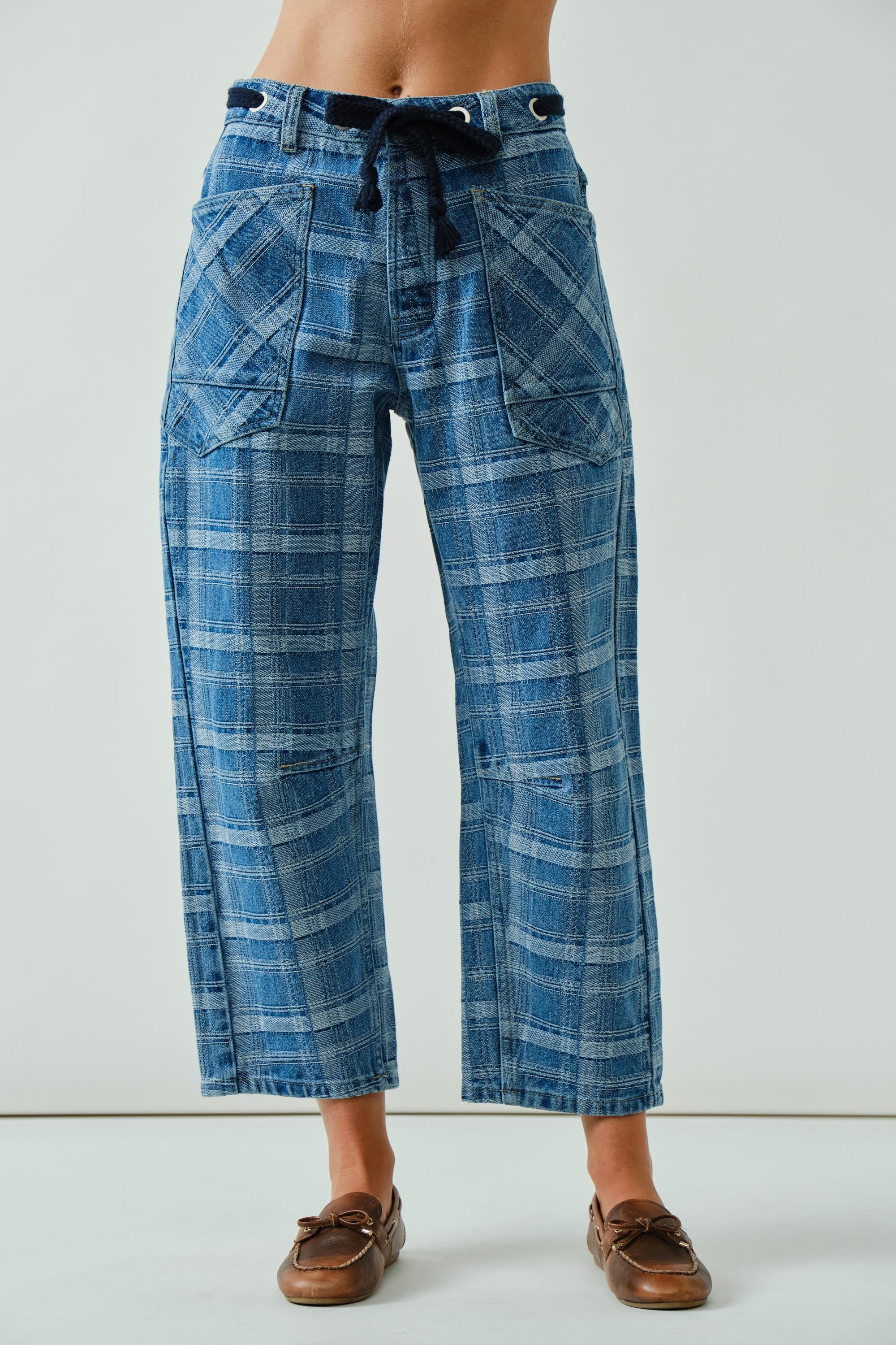 front view of the Moxie Barrel Eyelet Jeans in blue plaid showing barrel-leg fit
