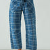 front view of the Moxie Barrel Eyelet Jeans in blue plaid showing barrel-leg fit