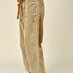 view of Moxie Barrel Eyelet Jeans in corduroy camel, showing the soft corduroy texture, cropped length, and slouchy relaxed fit.
