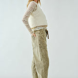 Moxie Barrel Eyelet Jeans in corduroy olive showing slouchy cropped fit  - side view