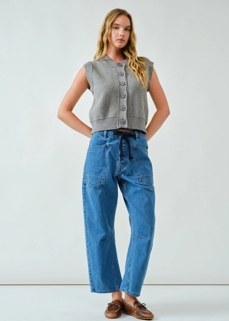 Front portrait of model wearing the Moxie Barrel Eyelet Jeans in medium jacquard stripes