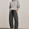 Moxie Barrel Eyelet Jeans in Polka Dot Black, front view, featuring a relaxed barrel-leg silhouette and white dot print.