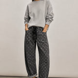 Moxie Barrel Eyelet Jeans in Polka Dot Black, front view, featuring a relaxed barrel-leg silhouette and white dot print.