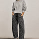 Moxie Barrel Eyelet Jeans in Polka Dot Black, front view, featuring a relaxed barrel-leg silhouette and white dot print.
