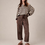 Moxie Barrel Eyelet Jeans in Polka Dot Brown front view with relaxed barrel leg fit and white dot print - full front view