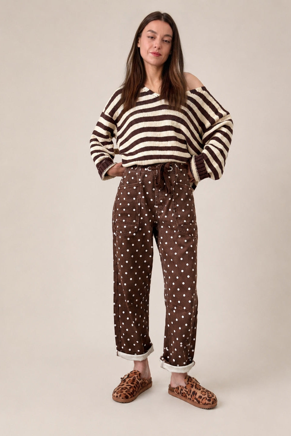 Moxie Barrel Eyelet Jeans in Polka Dot Brown front view with relaxed barrel leg fit and white dot print