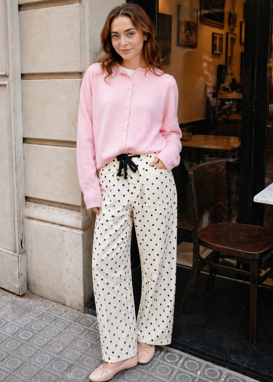 Woman wearing Moxie Polka Dot Barrel Jeans in Cream with a pink cardigan