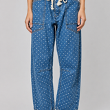 Front view of Moxie Barrel Eyelet Jeans in polka dot denim