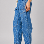 Side view of Moxie Barrel Eyelet Jeans in polka dot denim
