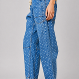 Side view of Moxie Barrel Eyelet Jeans in polka dot denim