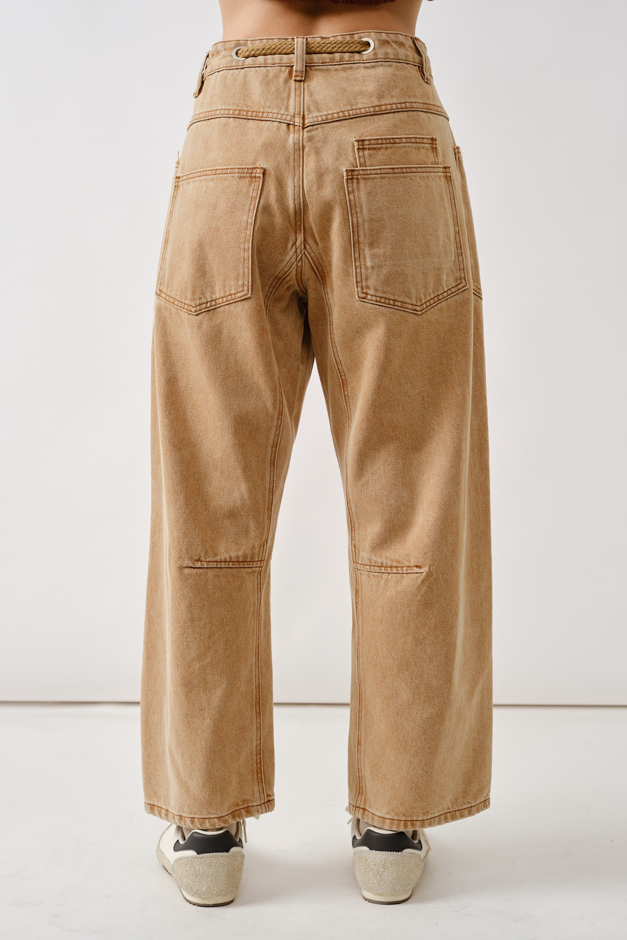 Back view of the Moxie Barrel Eyelet Jeans in rust