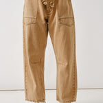 Front flat view of the Moxie Barrel Eyelet Jeans in rust