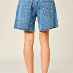 Back view of Moxie Barrel Shorts in Denim Dot with relaxed fit, soft denim fabric, and playful polka dot print.