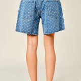 Back view of Moxie Barrel Shorts in Denim Dot with relaxed fit, soft denim fabric, and playful polka dot print.