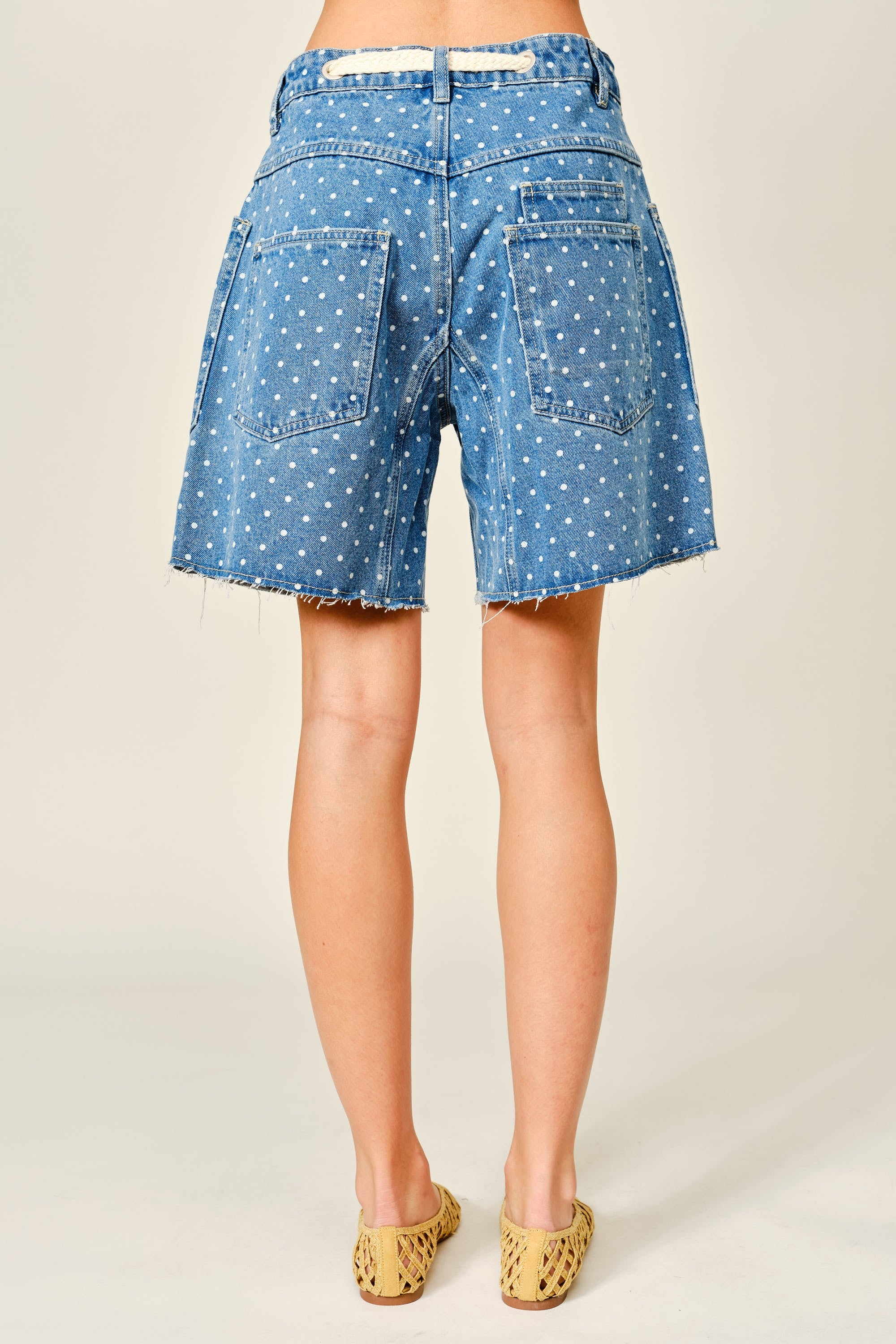 Back view of Moxie Barrel Shorts in Denim Dot with relaxed fit, soft denim fabric, and playful polka dot print.