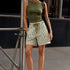 Woman wearing Moxie Barrel Shorts in Olive Stripe styled with an easy everyday outfit