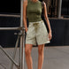 Woman wearing Moxie Barrel Shorts in Olive Stripe styled with an easy everyday outfit