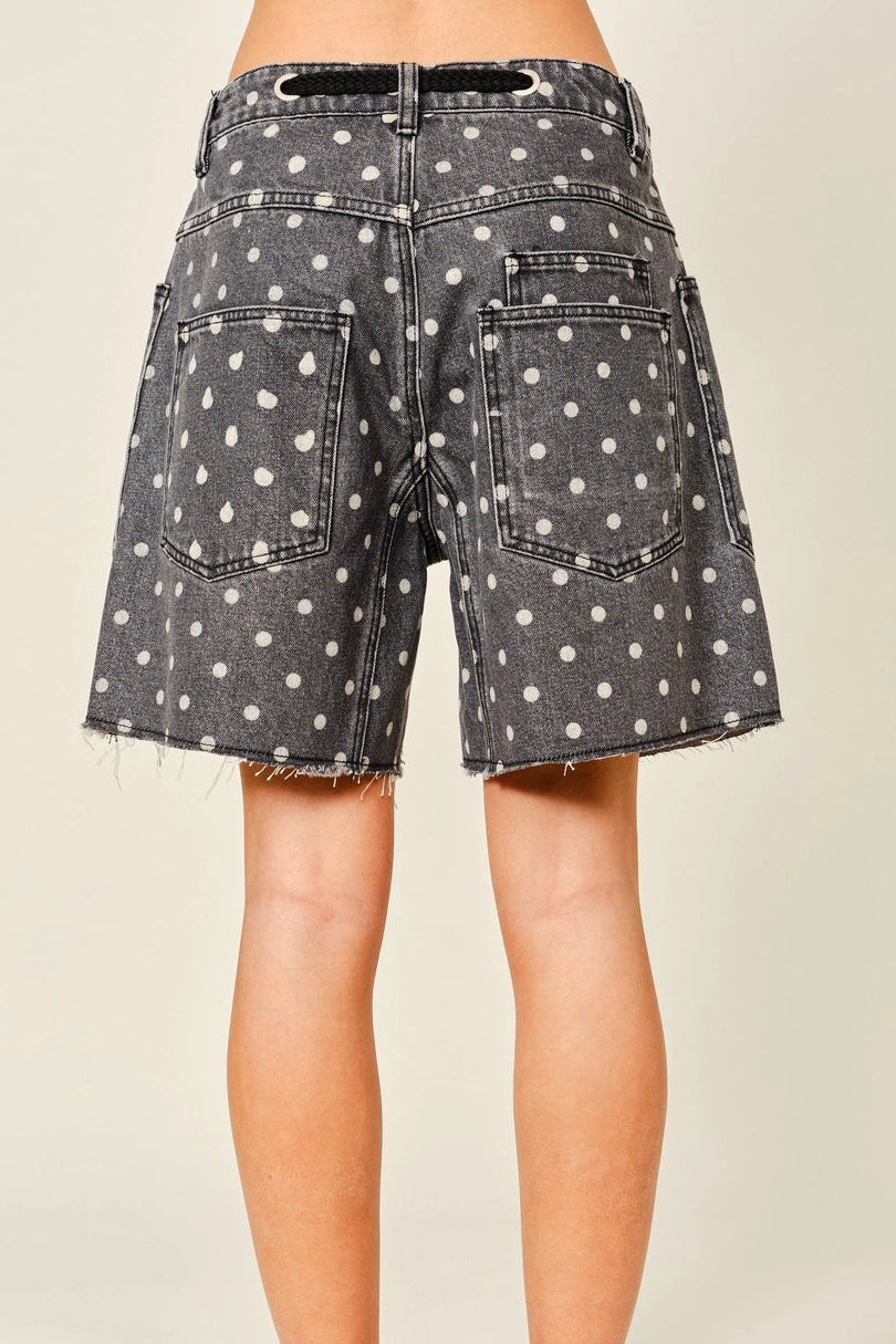 Back view of Moxie Barrel Shorts in charcoal black with white polka dots