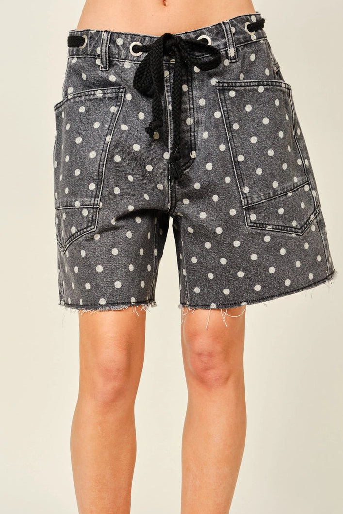 Front view of Moxie Barrel Shorts in charcoal black with white polka dots - closer-up