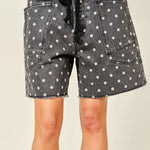 Front view of Moxie Barrel Shorts in charcoal black with white polka dots - closer-up