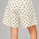 Moxie Barrel Shorts in Polka Dot Cream on model, studio back view