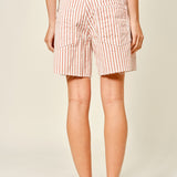 Moxie Barrel Shorts in Rust Stripe, back view with relaxed fit and raw-edge hem