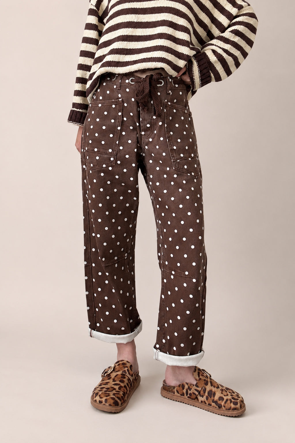Moxie Barrel Eyelet Jeans in Polka Dot Brown front view with relaxed barrel leg fit and white dot print - front-view-first-image
