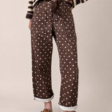 Moxie Barrel Eyelet Jeans in Polka Dot Brown front view with relaxed barrel leg fit and white dot print - front-view-first-image
