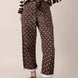 Moxie Barrel Eyelet Jeans in Polka Dot Brown front view with relaxed barrel leg fit and white dot print - front-view-first-image