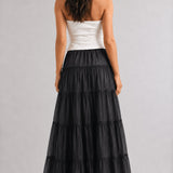 One Brynn black cotton maxi skirt shown back view