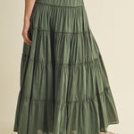 Back view of the cotton tiered maxi skirt in dill green