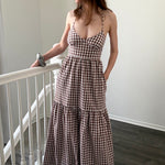 Paloma gingham maxi dress in brown, front view with flowy silhouette and adjustable straps
