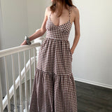 Paloma gingham maxi dress in brown, front view with flowy silhouette and adjustable straps