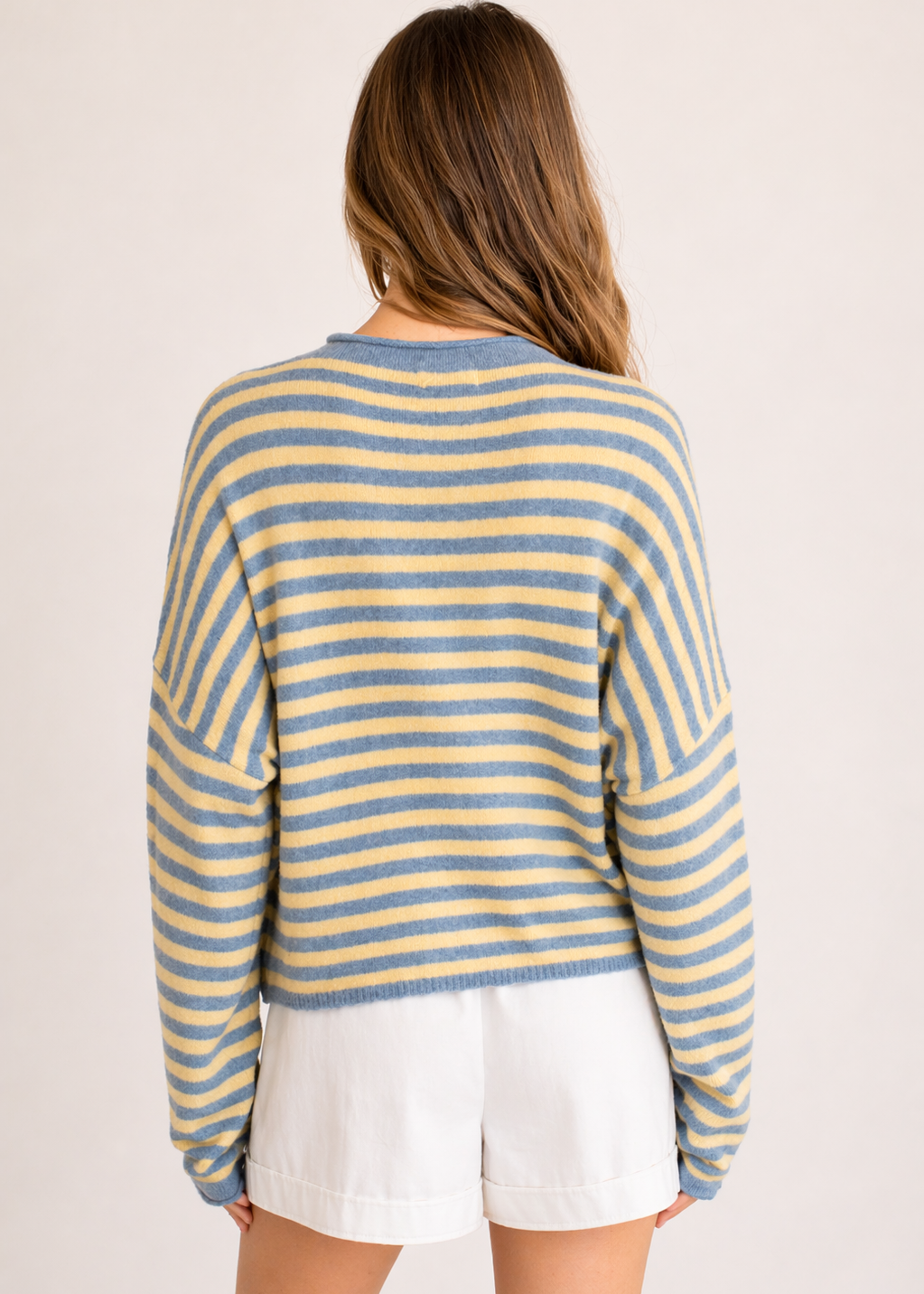 Piper Pullover Sweater in striped butter back view showing relaxed oversized fit