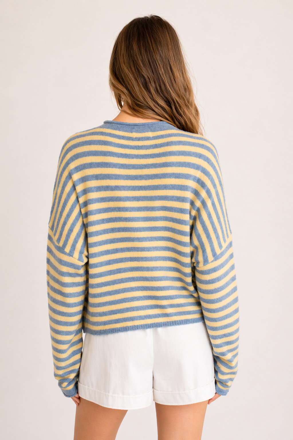 Piper Pullover Sweater in striped butter back view showing relaxed oversized fit