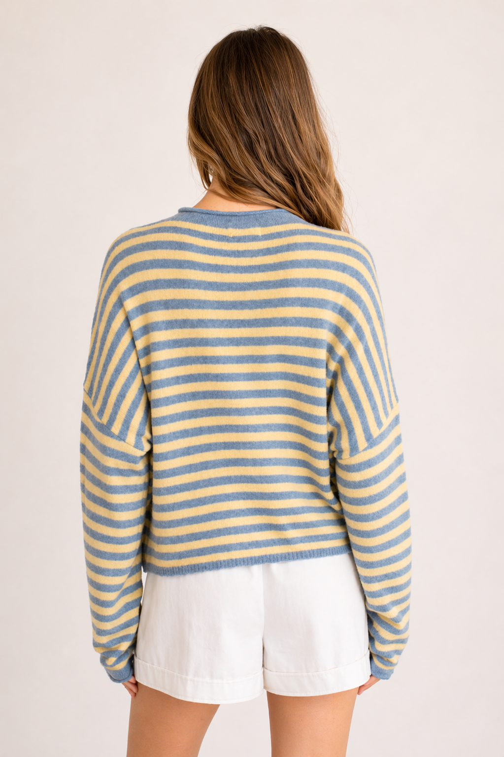 Piper Pullover Sweater in striped butter back view showing relaxed oversized fit