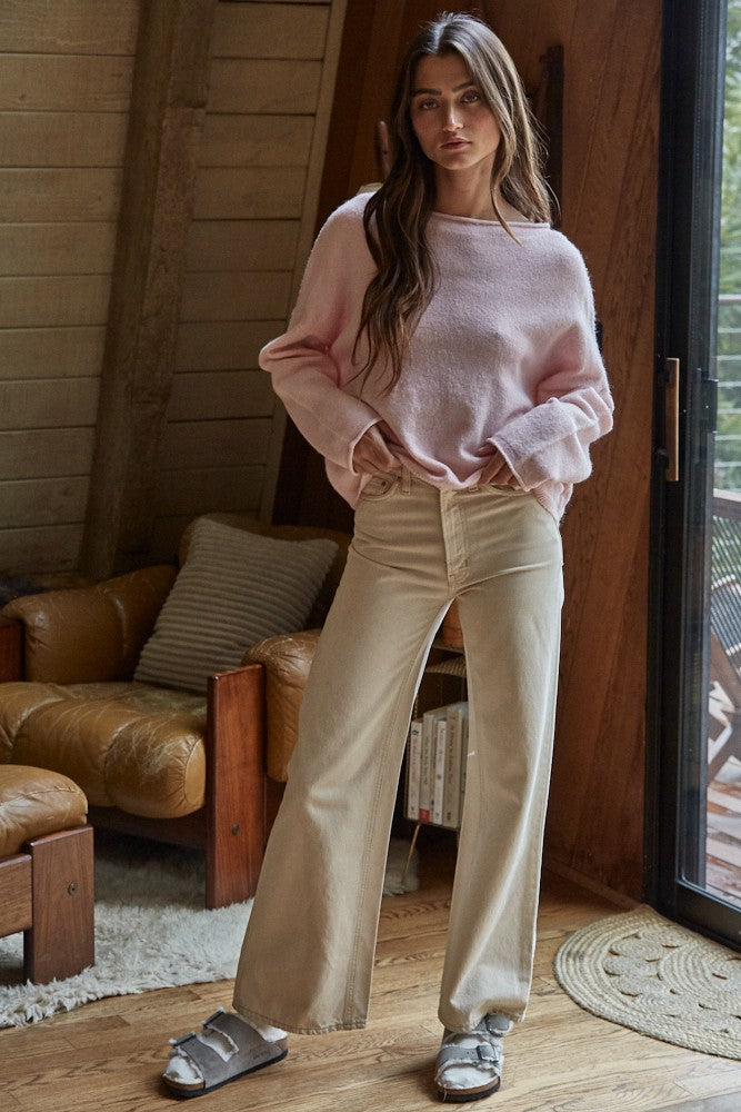 Model wearing the Piper Soft Knit Crew Sweater in Baby Pink with relaxed neutral pants - full view