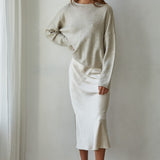 Piper soft knit crew sweater in heather grey styled with denim