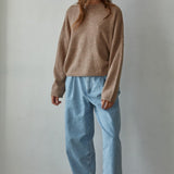 Piper soft knit crew sweater in mocha styled with a skirt