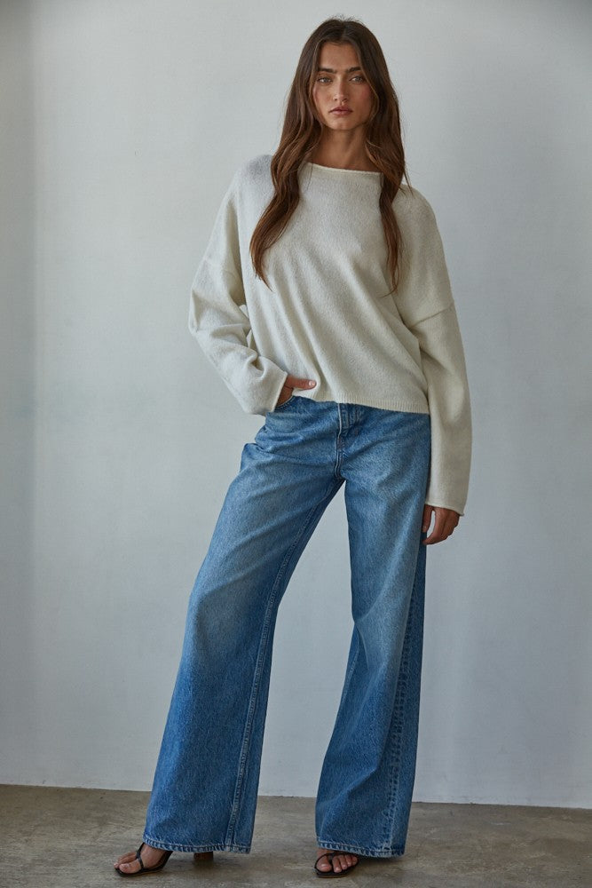 Piper soft knit crew sweater in off white styled in a full outfit, front view