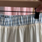 Close-up video showing elastic waistband, lining  and cotton gingham fabric