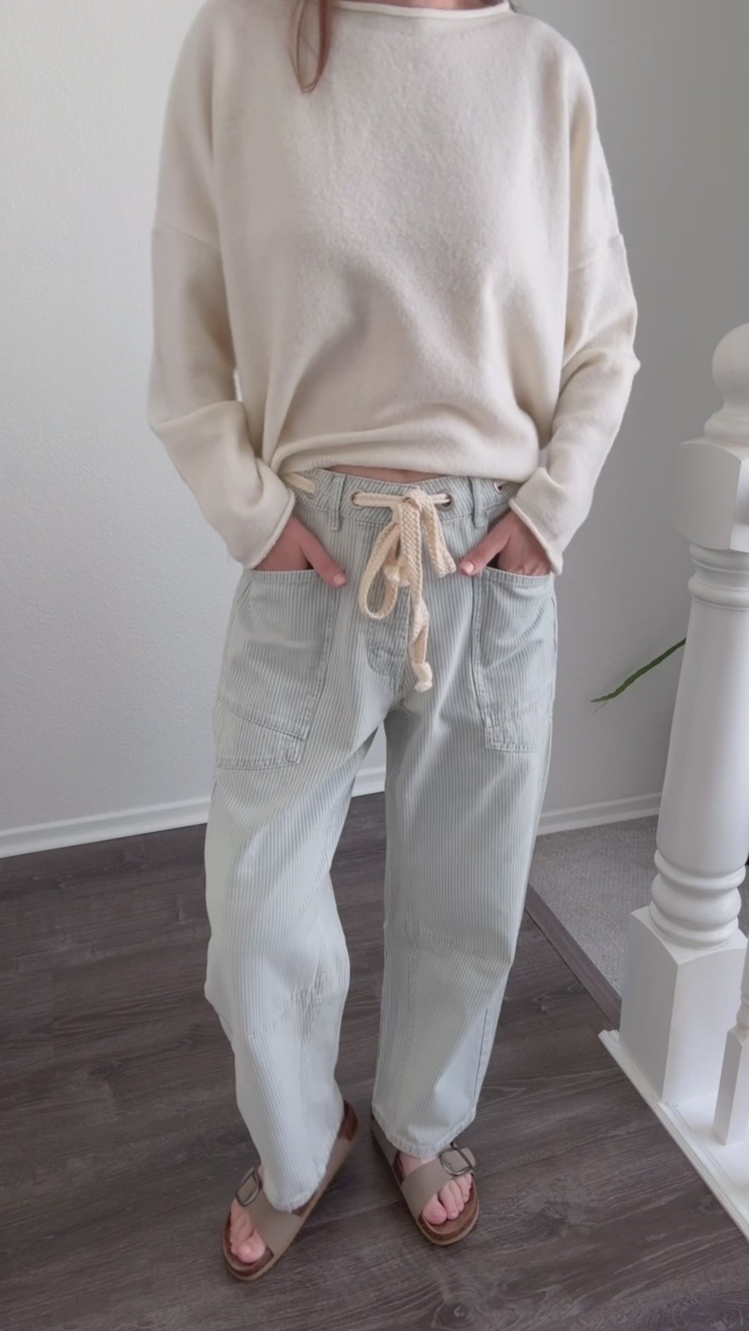 Try-on video of Moxie barrel eyelet jeans in denim stripe showing fit and movement