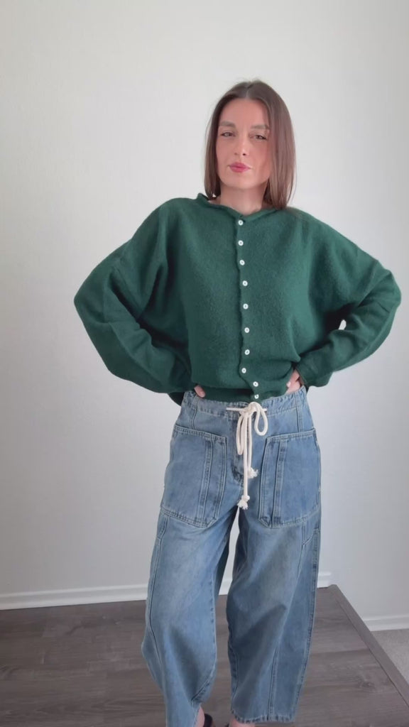 Try-on video of the Hailey button down cardigan in forest green showing fit and movement