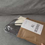 Unboxing video of the Sienna Knit Collar Puffer Jacket in brown, showing packaging, knit collar detail, quilted texture, and overall finish