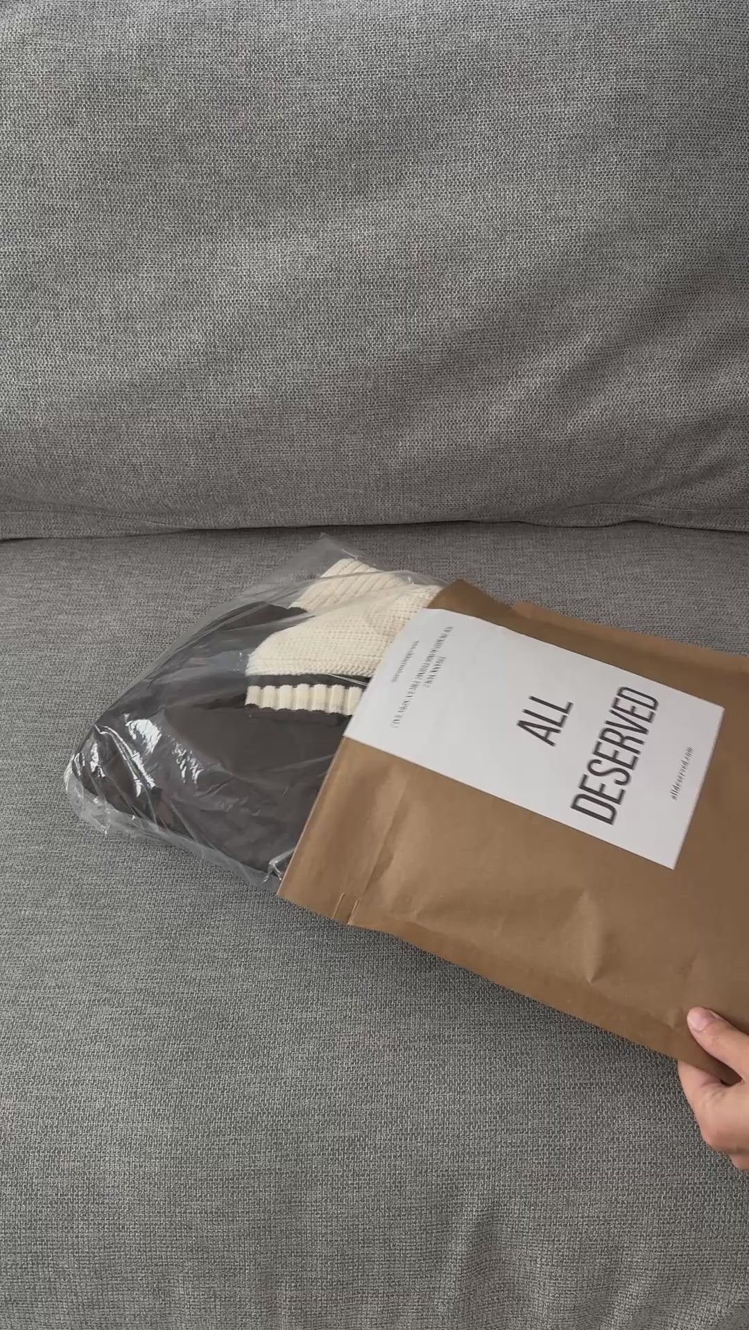 Unboxing video of the Sienna Knit Collar Puffer Jacket in brown, showing packaging, knit collar detail, quilted texture, and overall finish