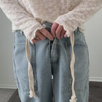 Try-on video of Moxie barrel eyelet jeans in light jacquard stripe showing fit and movement